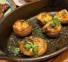 Pan-Seared Mushrooms with Ham and Olive Crisp