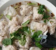 Chinese Herb Pork Dumplings with Peanut Sauce