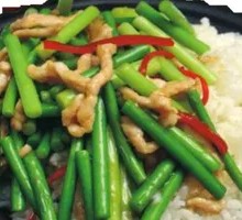 Stir-fried Garlic Shoots with Pork over Rice