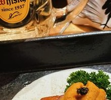 Grilled Wagyu Beef and Foie Gras Roll with Sea Urchin