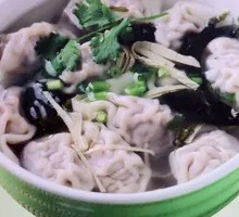 Mustard Greens and Pork Dumplings