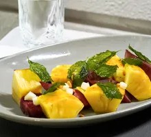 Charcoal-Grilled Smoked Beef Tongue with Pineapple, Pine Nuts and Green Sand