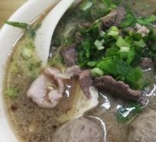 Beef tendon meatball pork offal rice soup