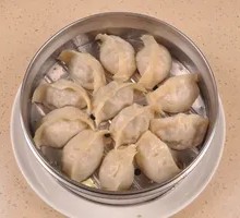 Mustard Greens and Pork Dumplings