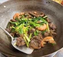 Flame-Infused Duck in Wine Sauce