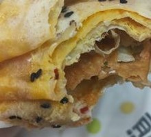 Double Egg Bacon and Sesame Seed Pancake