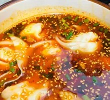 Sour Spicy Pork Dumplings