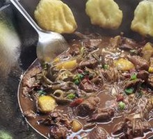 Stewed Pork Ribs and Chicken in Iron Pot