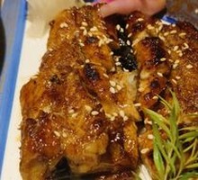 Homemade Live Eel Grilled with Bamboo