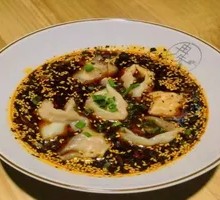Spicy Pork Dumplings in Red Soup