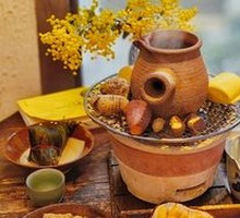 Tea Boiled by a Hearth