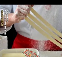 Signature Hand-Caught Noodles