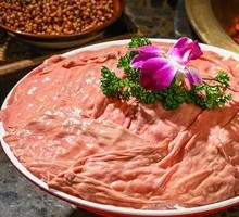 Freshly Sliced Pork Kidney with Big Knife