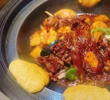 Stewed Pork Ribs and Chicken in Iron Pot