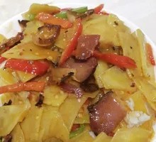 Fried Potato Slices with Preserved Meat Over Rice
