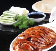 Peking Duck with Scallion and Cucumber Strips on Pancake