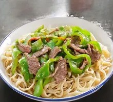 Stir-Fried Pork with Green Pepper over Noodles