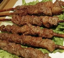 Lamb Skewers on Red Willow Branches