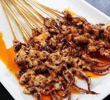 Sizzling Squid on Iron Plate