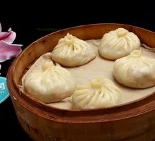 Tomato and Pork Soup Dumplings