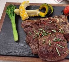 Charcoal-Grilled Grain-Fed Tomahawk Steak