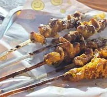 Lamb Skewers on Red Willow Wood
