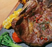 Charcoal-Grilled Grain-Fed Tomahawk Steak
