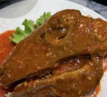 Sauce-Drizzled Lamb Head