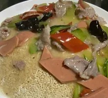 Fried Rice Noodles with Pork