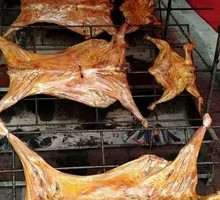 Whole Lamb Roasted Over Charcoal